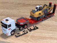 Amsler AG DAF XF 106 SC mit Mobilbagger